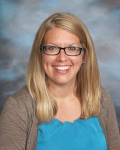 A headshot of Sarah Bosch taken on a school picture day