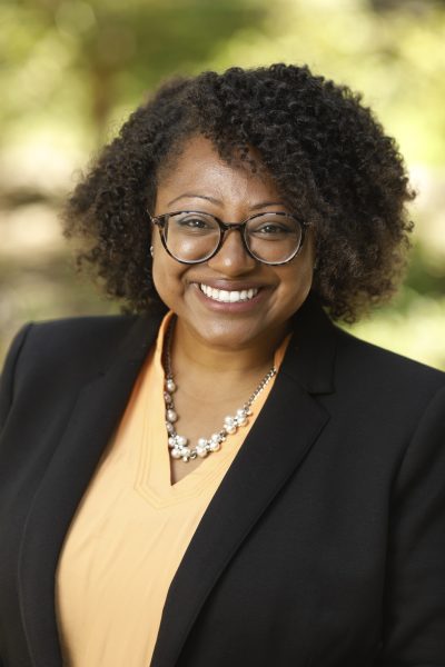 A headshot of Valyncia Raphael-Woodward