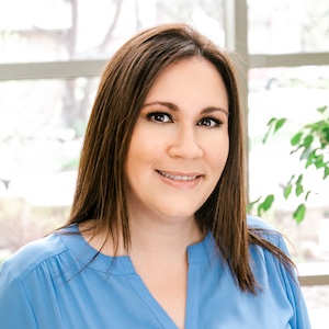Headshot of Arabel Marcano Colón, who is pictured in front of a window.
