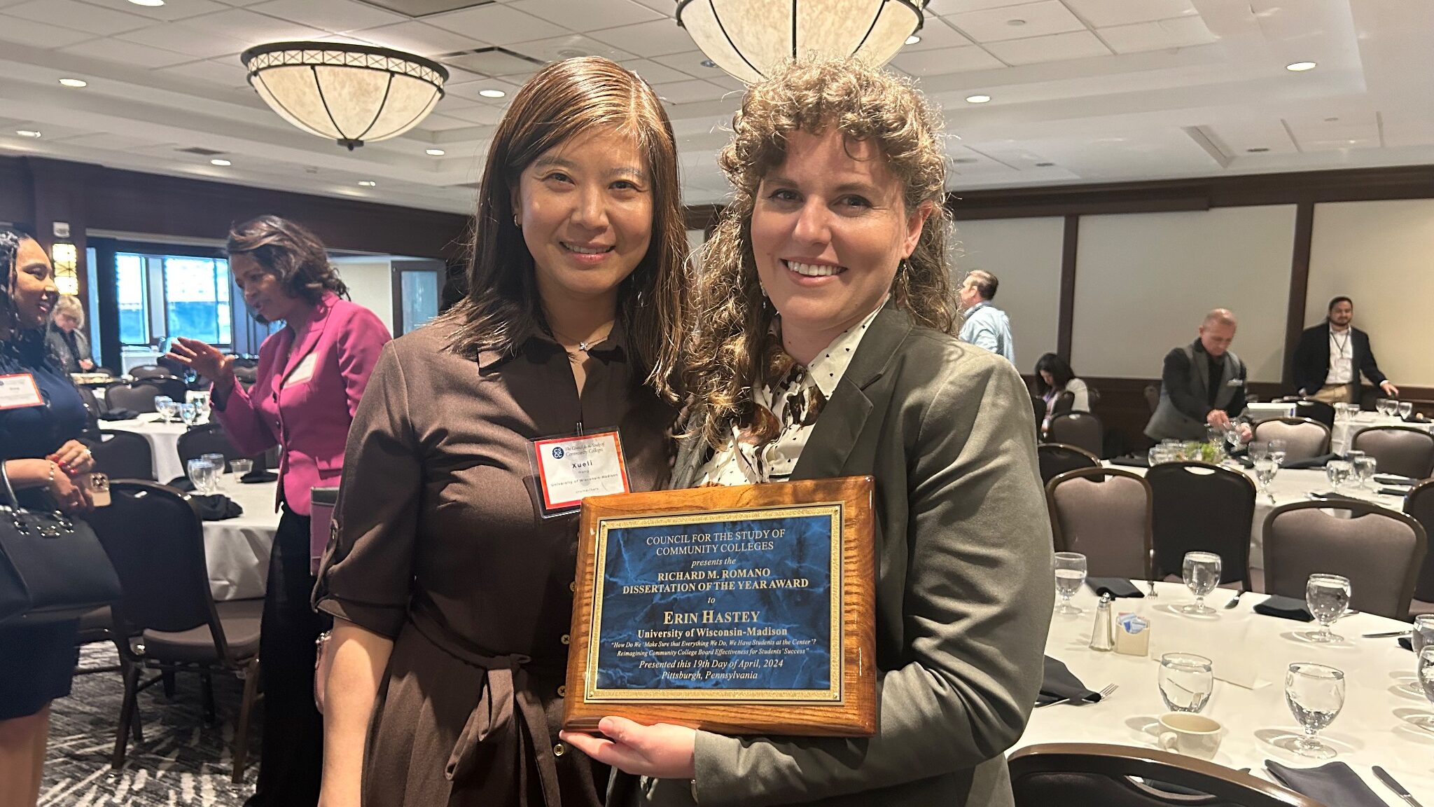 Dr. Erin Hastey (Right) with her doctoral advisor Dr. Xueli Wang (Left) after receiving her 